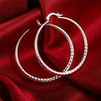 Kostenlose Creolen mit Diamantschliff für Damen