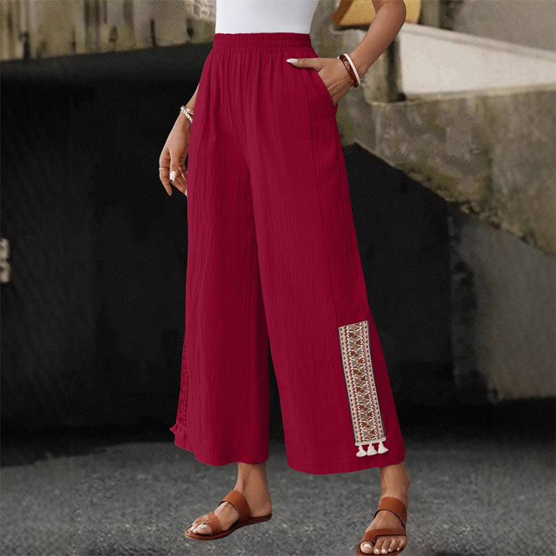 Damenhose mit elastischem Bund, weitem Bein und Quasten