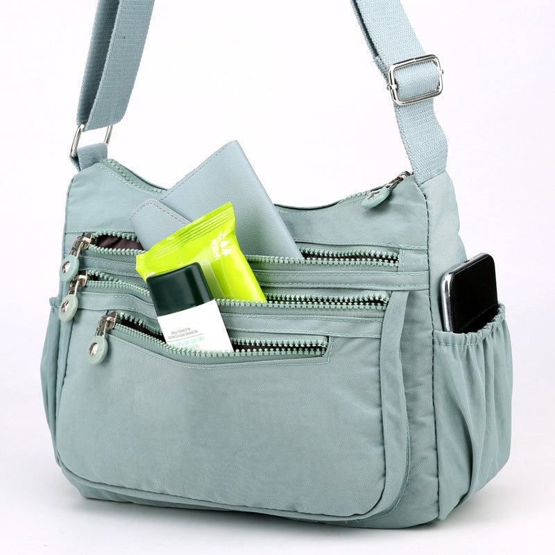 Lichtgewicht nylon crossbodytas met meerdere vakken