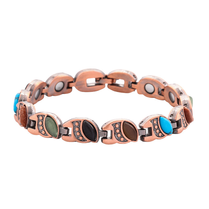 Armband met magnetische steen en antiek-koperkleurige afwerking